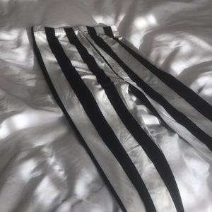 White and black striped “beetle juice” leggings